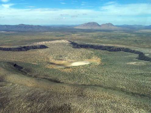 Oblique aerial view of Hunt's Hole, south of and smaller than its volcanic neighbor Kilbourne Hole